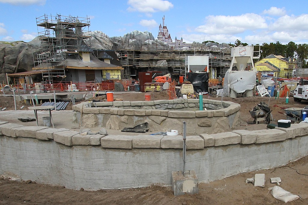 Fantasyland - Be Our Guest restaurant at Beast's Castle, and the cottage to the left.