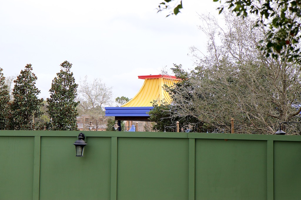 Fantasyland - Walkway lighting poles visible over the walls