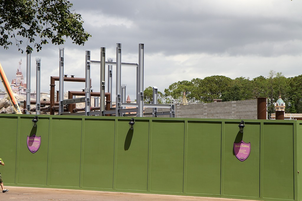 Fantasyland - Seven Dwarf's Mine Train coaster - grey steel is structural facade supports, brown steel is coaster track supports