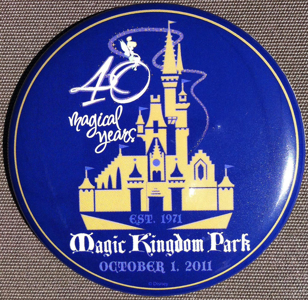 Magic Kingdom - 40th buttons handed out to guests at the turnstiles