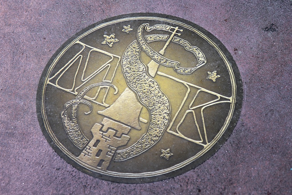 Sorcerers of the Magic Kingdom - Out in the park, these markers on the ground indicate where to stand
